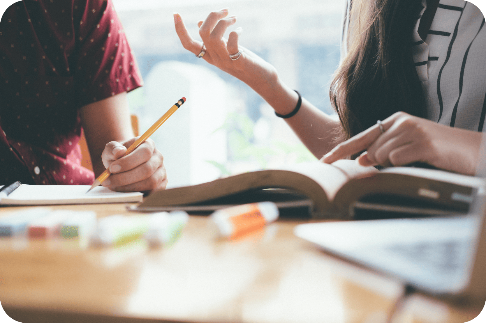 Students at a Laraway Table with their Books and Pencils