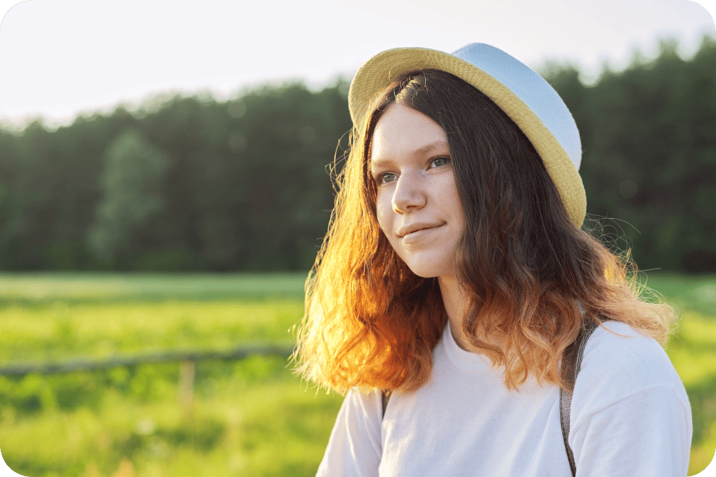 Student at Laraway enjoying a beautiful dusk view of the landscape